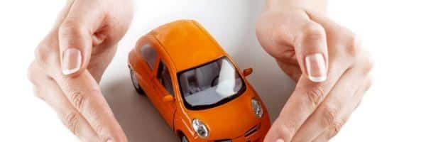 car insurance hands around car